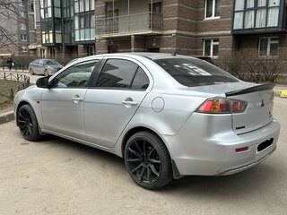 2011 Mitsubishi Lancer X Рестайлинг, серебристый, 570000 рублей, вид 2