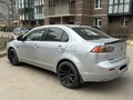 2011 Mitsubishi Lancer X Рестайлинг, серебристый, 570000 рублей - вид 1