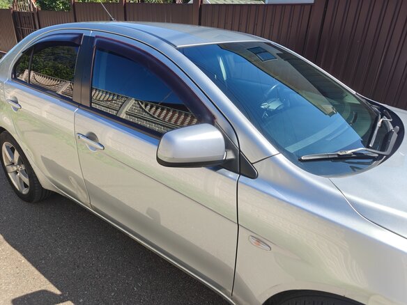 2008 Mitsubishi Lancer X, серебристый - вид 19