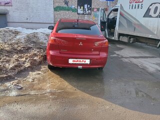 2009 Mitsubishi Lancer X, красный, 550000 рублей, вид 3