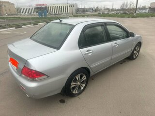 2005 Mitsubishi Lancer IX Рестайлинг, серебристый, 700000 рублей, вид 4