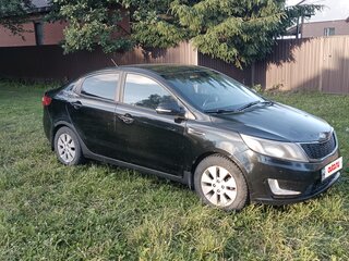 2012 Kia Rio 5-speed III, чёрный, 430000 рублей, вид 2