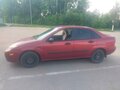 2000 Ford Focus I (North America), пурпурный, 230000 рублей - вид 3