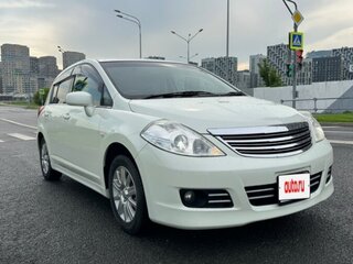 2010 Nissan Tiida I, белый, 990000 рублей, вид 2