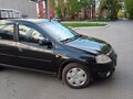 2011 Renault Logan I Рестайлинг, чёрный, 485000 рублей - вид 2