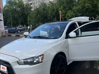 2011 Mitsubishi Lancer X Рестайлинг, белый, 799999 рублей, вид 2
