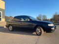 1998 Kia Sephia II, чёрный, 140000 рублей - вид 2