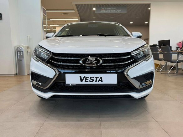2026 Lada (ВАЗ) Vesta I Рестайлинг (NG), белый, 1768935 рублей - вид 1