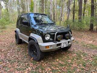 1995 Mitsubishi Pajero Junior, зелёный, 600000 рублей, вид 3
