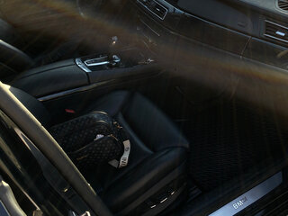 2011 BMW 7 серии Long 750Li V (F01/F02/F04), чёрный, 1550000 рублей, вид 5