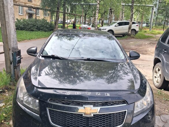 2010 Chevrolet Cruze I, чёрный, 600000 рублей