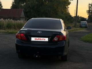 2007 Toyota Corolla X (E140, E150), чёрный, 620000 рублей, вид 3