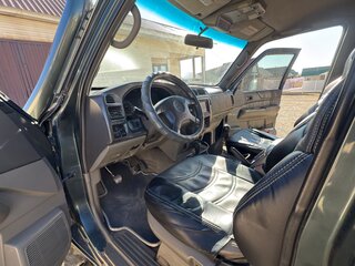1999 Nissan Patrol V (Y61), серый, 1850000 рублей, вид 5