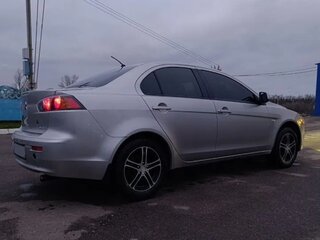 2012 Mitsubishi Lancer X Рестайлинг, серебристый, 750000 рублей, вид 4