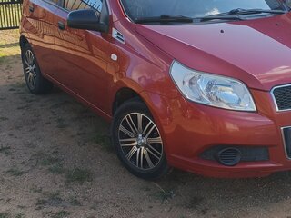 2009 Chevrolet Aveo I Рестайлинг, красный, 450000 рублей, вид 1