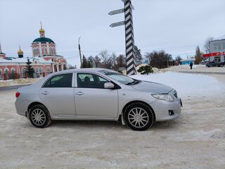 2010 Toyota Corolla X (E140, E150), серебристый, 900000 рублей, вид 1