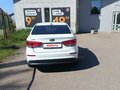 2016 Kia Rio III Рестайлинг, белый, 860000 рублей - вид 3