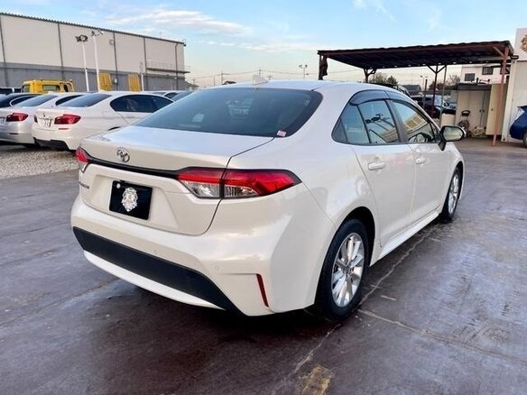 2021 Toyota Corolla XII (E210), белый, 1540084 рублей - вид 6