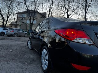 2012 Hyundai Solaris I, чёрный, 655000 рублей, вид 3