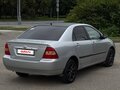 2002 Toyota Corolla IX (E120, E130), серый - вид 3