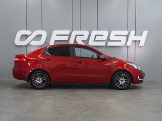 2013 Kia Rio 5-speed III, красный, 829000 рублей, вид 5