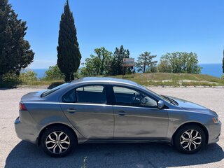 2012 Mitsubishi Lancer X Рестайлинг, серый, 900000 рублей, вид 4