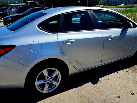 2012 Opel Astra J Рестайлинг, серебристый, 550000 рублей - вид 6
