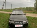 2010 Daewoo Nexia I Рестайлинг, чёрный, 335000 рублей - вид 3