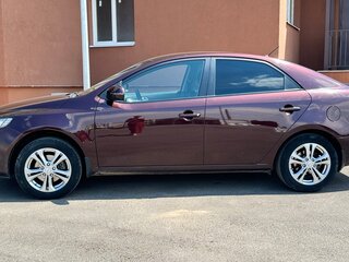 2010 Kia Cerato 6-speed II, пурпурный, 700000 рублей, вид 2