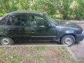 2011 Daewoo Nexia I Рестайлинг, чёрный, 150000 рублей - вид 2
