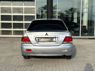 2006 Mitsubishi Lancer IX Рестайлинг, серебристый, 230000 рублей, вид 4