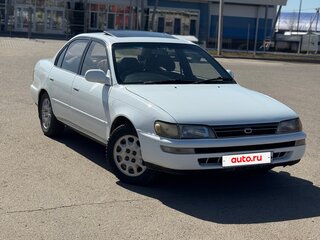 1993 Toyota Corolla VII (E100), белый, 310000 рублей, вид 1