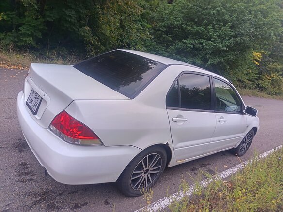 2003 Mitsubishi Lancer Cedia IX, белый, 350000 рублей - вид 14