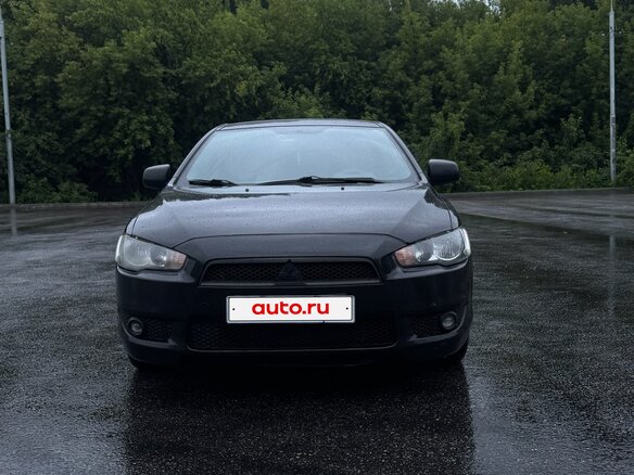 2010 Mitsubishi Lancer X, чёрный, 685000 рублей - вид 2