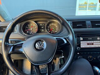 2015 Volkswagen Jetta VI Рестайлинг, чёрный, 1050000 рублей, вид 5