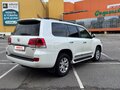 2016 Toyota Land Cruiser 200 Series Рестайлинг 2, белый - вид 4
