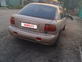 1997 Kia Sephia I Рестайлинг, бежевый, 280000 рублей