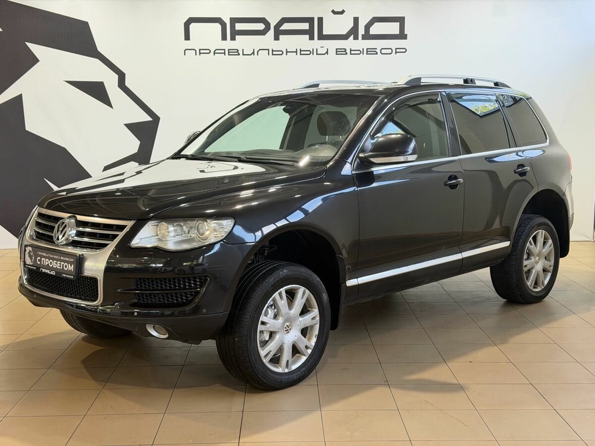 Открыть фотографии: Volkswagen Touareg I Рестайлинг