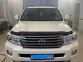2013 Toyota Land Cruiser 200 Series Рестайлинг 1, белый, 3200000 рублей - вид 1
