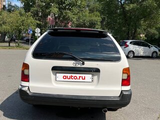 1997 Toyota Corolla VII (E100), белый, 310000 рублей, вид 3