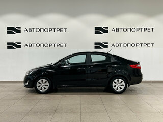 2012 Kia Rio 5-speed III, чёрный, 699000 рублей, вид 3