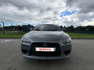 2012 Mitsubishi Lancer X Рестайлинг, серебристый, 930000 рублей, вид 1