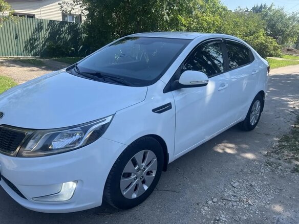 2012 Kia Rio 4-speed III, белый - вид 1