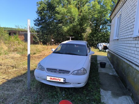1999 Kia Clarus II, белый, 300000 рублей, вид 2