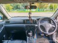 2003 Toyota Corolla Runx IX (E120, E130), серый, 530000 рублей - вид 9