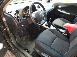 2012 Toyota Corolla X (E140, E150) Рестайлинг, чёрный, 650000 рублей, вид 4