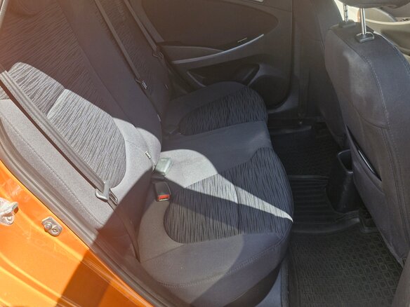 2015 Hyundai Solaris I Рестайлинг, оранжевый, 790000 рублей - вид 8