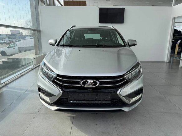 2026 Lada (ВАЗ) Vesta SW I Рестайлинг (NG), серебристый - вид 2