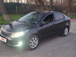2012 Kia Rio 5-speed III, чёрный, 701000 рублей, вид 1
