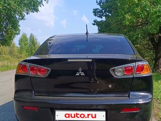 2010 Mitsubishi Lancer X, чёрный, 600000 рублей, вид 2